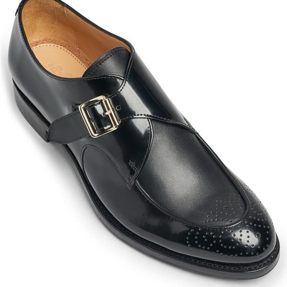 Very gently worn black monk strap leather flats.